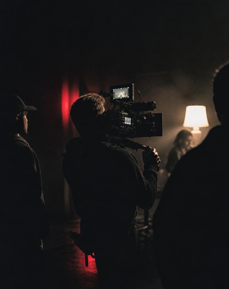 A film crew shooting on location at night